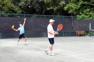 Participants took to the tennis courts for an extraordinary pro-am tennis tournament. 