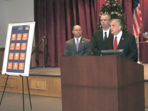 From left: Det. Sgt. Patrick Ryder, acting Nassau County Police Commissioner Thomas Krumpter and Nassau County Executive Ed Mangano