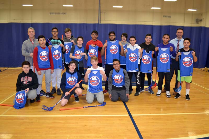 Students practice skills with the support of the NY Islanders Photo