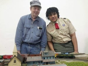 Ray Muntz and Westbury Boy Scout Troop 233 member Adam Campbell