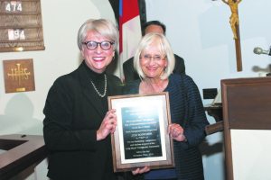 Supervisor Judi Bosworth with Juli Grey-Owens, executive director of the Long Island Transgender Advocacy Coalition (LITAC), as she is presented an award from LITAC and the Transgender Day of Remembrance Committee for her leadership in transgender antidiscrimination in North Hempstead.