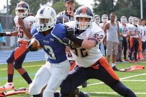 Thomas Davis goes for a touchdown in the 2014 Homecoming game against Great Neck North.