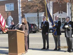 Singer Catherine Lau closing the service with God Bless America last year.