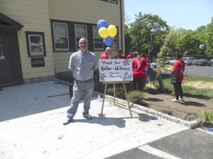 John Baldi, head of the Vincent Smith School, with volunteers