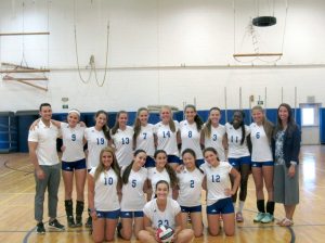 Head Coach Melinda DiGiovanna, Assistant Coach Adam Epstein and the 2015 Schreiber girls volleyball team