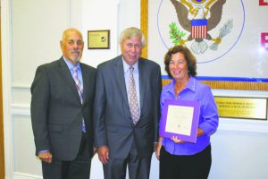 Ralph Ferrie (left) and David Fowler are pictured with Alison Leighton. 