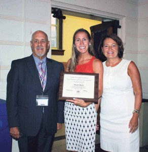 Floral Park Memorial High School special education teacher Susan Bach (center) is pictured with Superintendent of Schools Dr. Ralph Ferrie (left) and Principal Dr. Kathleen Sottile.   