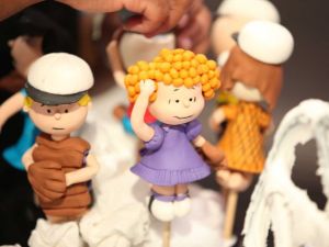 One of the winning creations from the third season of Cake Wars . “The details are amazing,” judge Ron Ben-Israel declared of baker Kelly’s creation featuring Charlie Brown and his pals at the would-be baseball game in Charlie Brown’s All-Stars.