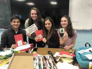 Floral Park seniors (l-r): Vishal Mirchandani, Nora Brennan, Tina Seuling, Nicole Metrick enjoyed making holiday cards for sick children.