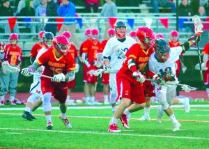 Chaminade defends against Manhasset’s Matt Gavin.