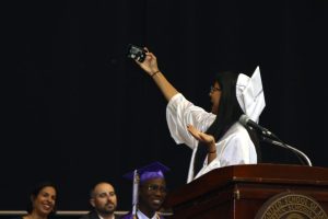 Valedictorian Merlyn John took a selfie after her valedictorian address.