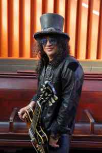 Slash with his Gibson ES 335 Photo credit Gene Kirkland 683x1024 1