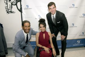 From left: Bryant Gumble, Mariah Sepulveda and Eli Manning