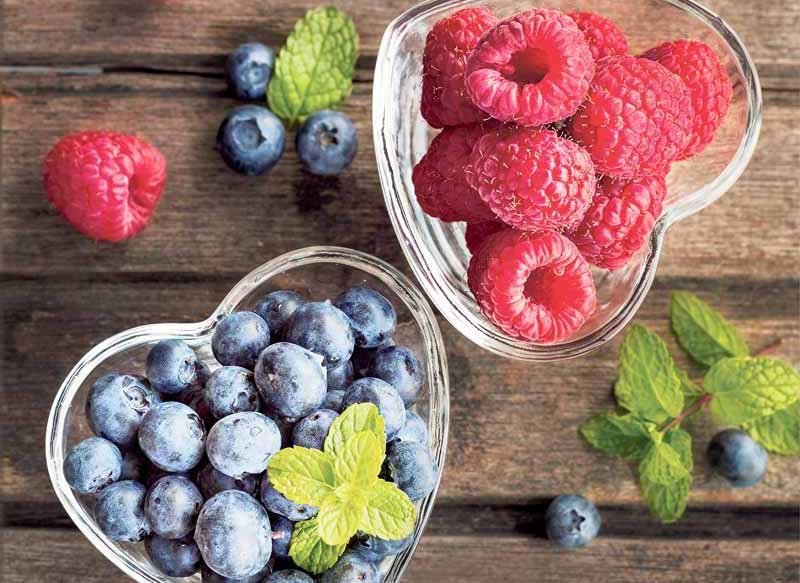 Mix of fresh berries in a glass ramekins