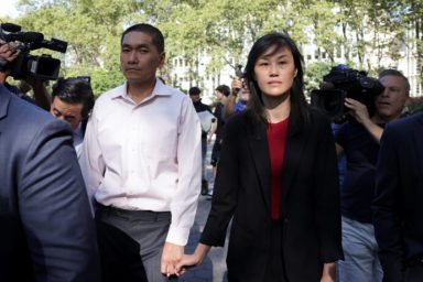 Linda Sun, a former aide to New York State Governor Kathy Hochul, exits Brooklyn Federal court with Chris Hu after Linda was charged with acting as an unregistered agent of China’s government, in New York City