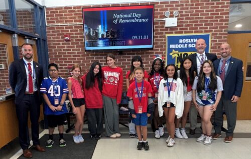 24 013 RMS AP Justin Gabrus Principal Craig Johanson and AP Christopher Roth with students wearing red white and blue 500x317 1