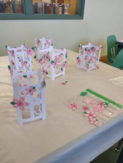 An adult craft program made Cherry Blossom Lattices to display