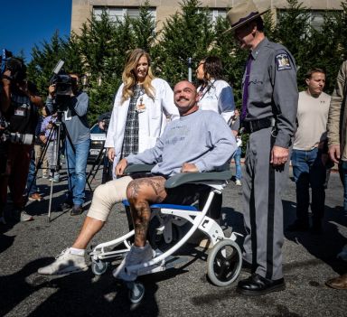 Wounded NYS Trooper Thomas Mascia leaves in wheelchair from hospital in East Meadow, New York