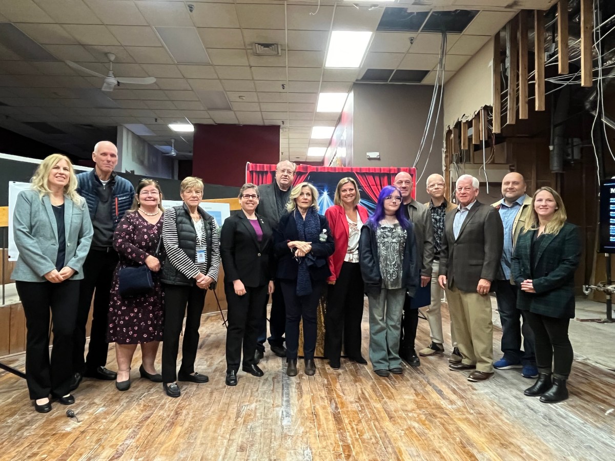 Local officials and businessowners welcome North Shore Village Theatre to 19 Glen St (Photo provided by the Glen Cove Downtown Business Improvement District)