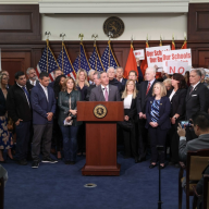 State Sen. Jack Martins speaks at a rally in opposition to New York State Department of Education's Regionalization plan