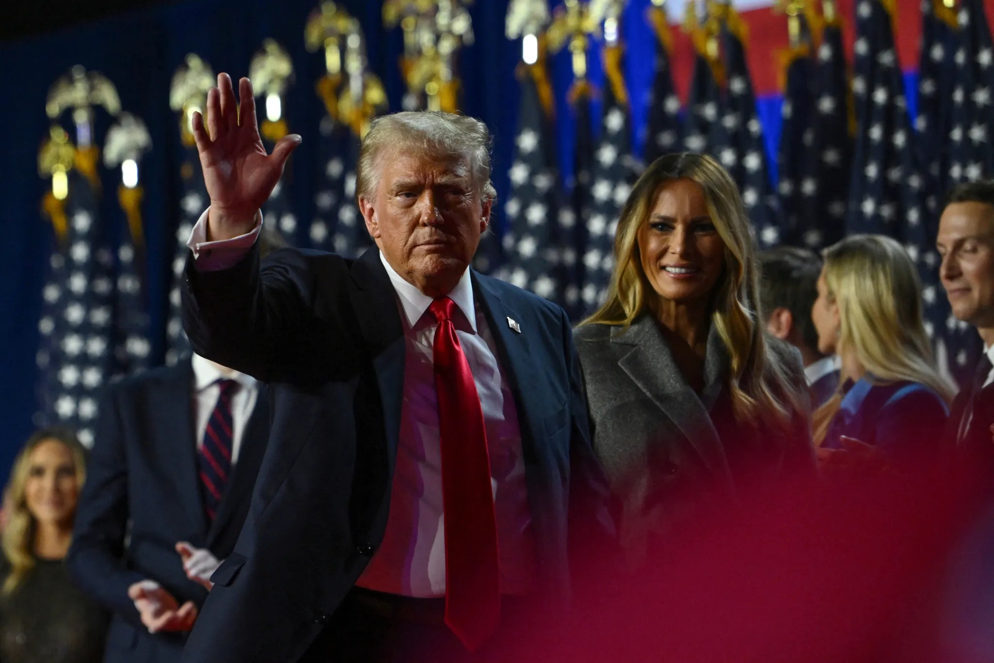 Republican presidential nominee and former U.S. President Donald Trump waves while walking off stage following early results from the 2024 U.S. presidential election in Palm Beach County Convention Center, in West Palm Beach, Florida, U.S., November 6, 2024. REUTERS/Callaghan O’Hare