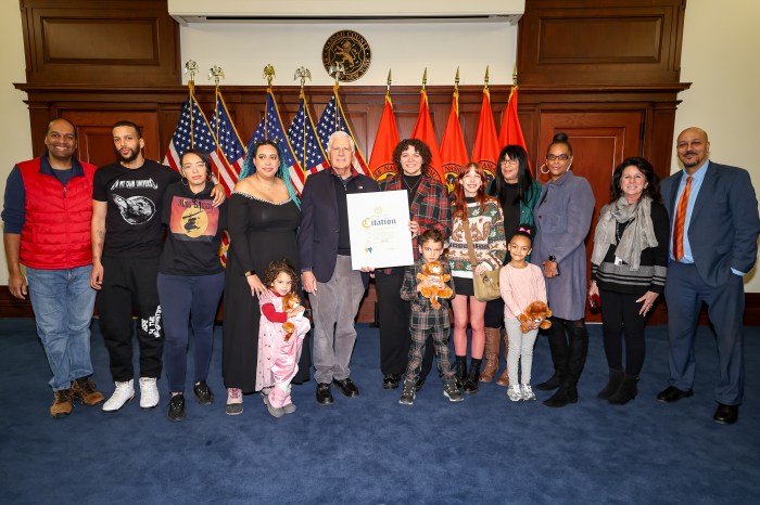 Nassau County Executive Bruce Blakeman, center left, awards Shye Roberts, center right, for her achievement on Season 26 of "The Voice"