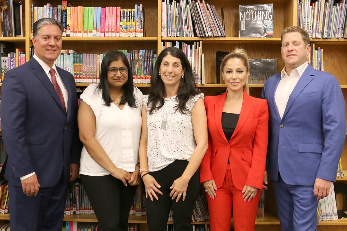 The Jericho Board of Education votes to opt out of regionalization. From let to right, Christopher Foresto, Divya Balachandar, Jill Citron, Jennifer Vartanov, Samuel Perlman