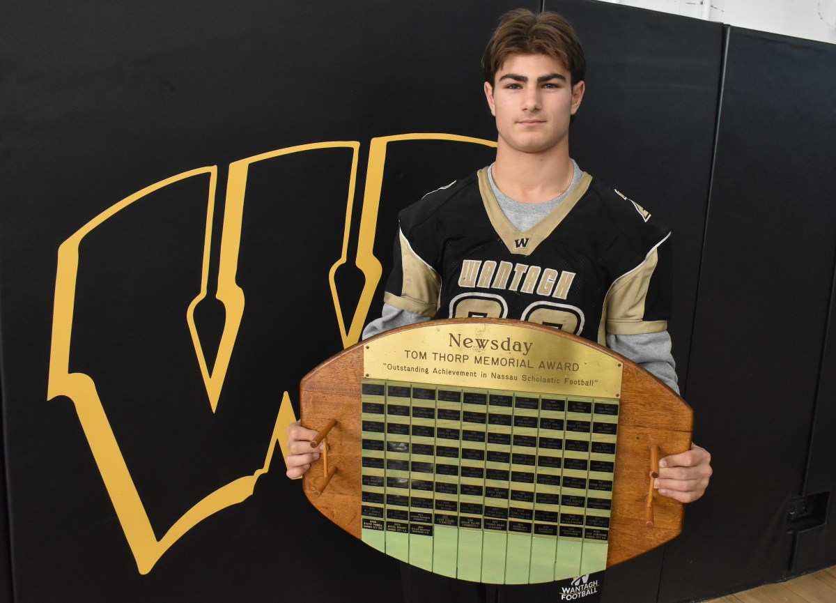 Senior Dylan Martini is the first Wantagh High School athlete to get his name on the Tom Thorpe Memorial Award Plaque in its 83-year history as the most outstanding football player in Nassau County.