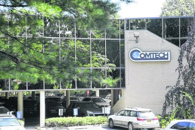 The exterior of the Comtech Telecommunications Corp., building in Melville on June 24, 2016. Some global companies are moving away from Long Island