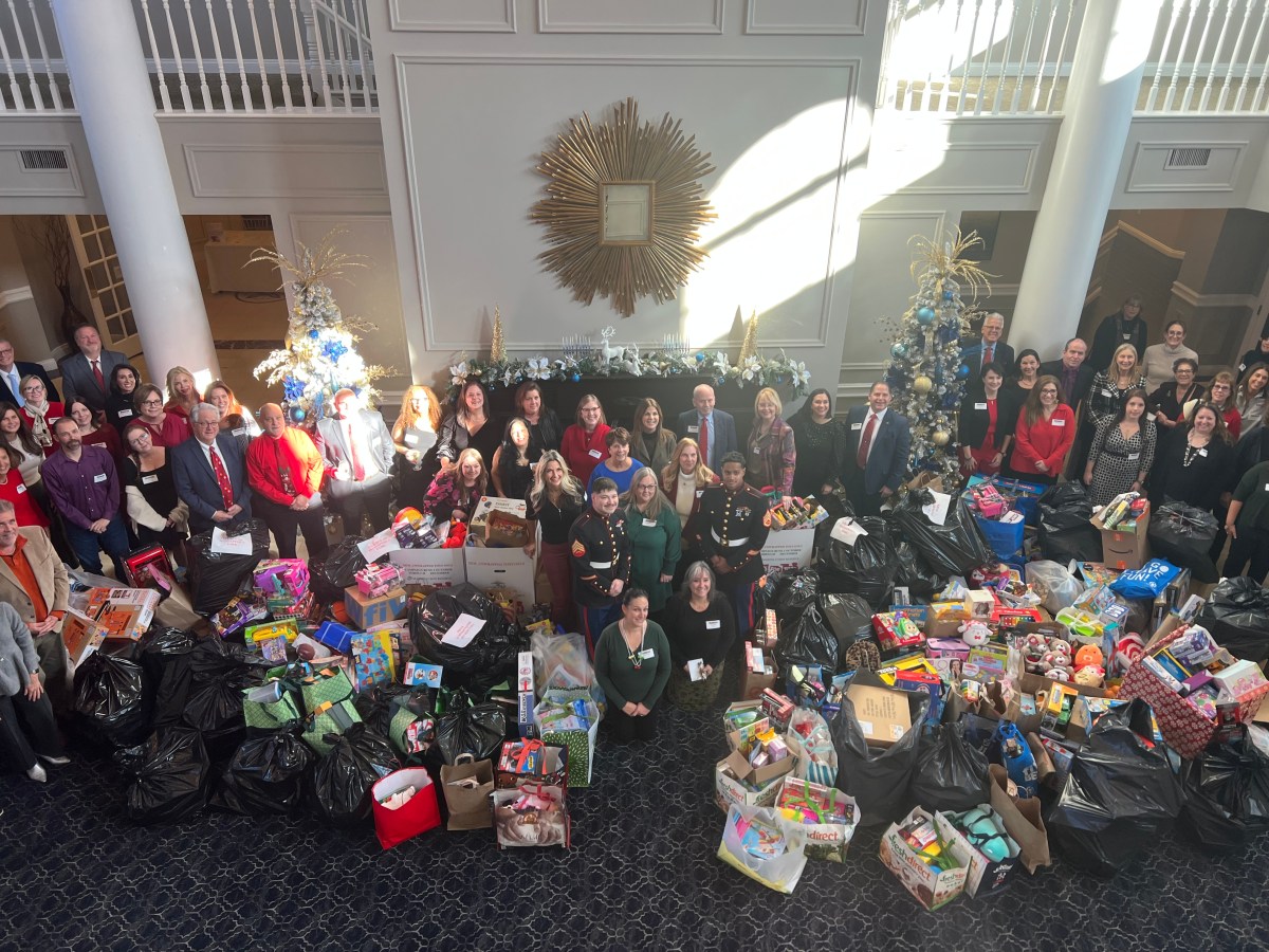 The Long Island Village Clerks and Treasurers Association's annual Holiday Luncheon and Toy Collection aids Toys for Tots.