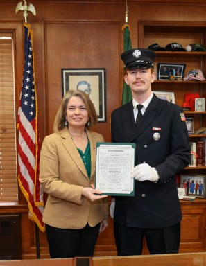 North Hempstead Town Supervisor Jennifer DeSena honors Great Neck Alert firefighter Richard Deem for his quick, decisive actions that saved his grandfather’s life.