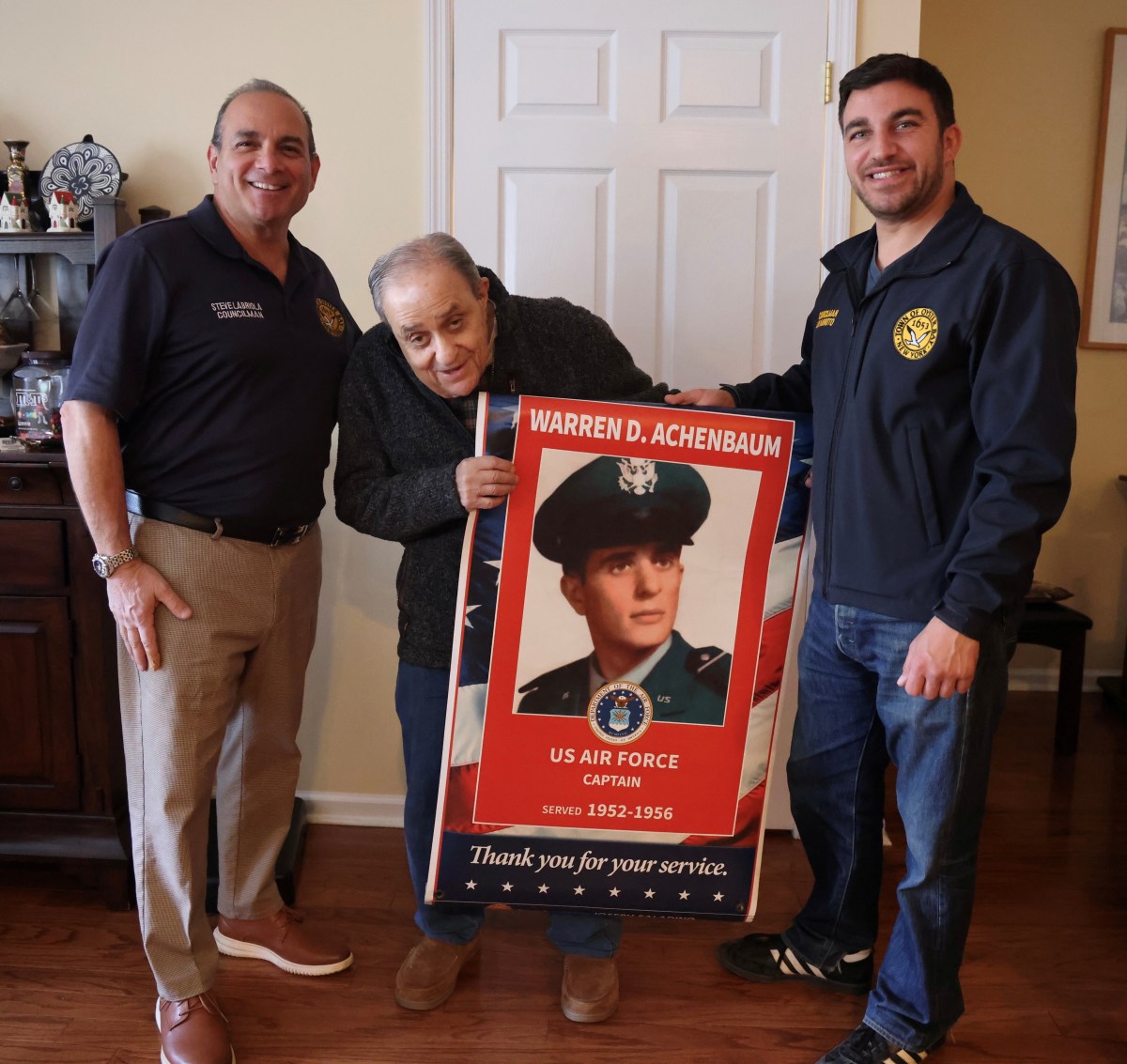 Pictured from right to left: Councilman Steve Labriola, Retired United States Air Force Captain Warren Achenbaum of Massapequa, and Councilman Louis Imbroto