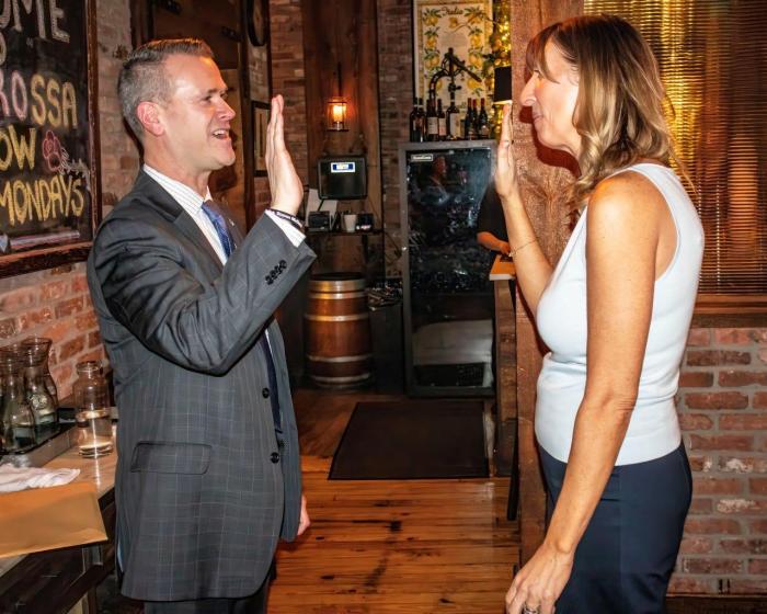 Malverne Mayor Tim Sullivan swearing in Elizabeth Krull as President of the Malverne Chamber of Commerce.