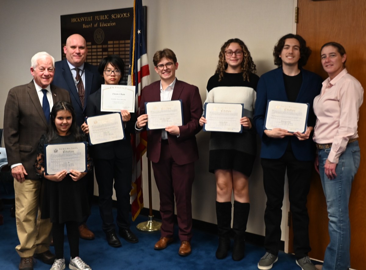 Students recognized at Hicksville Board of Education meeting with Representative Charles Lavine