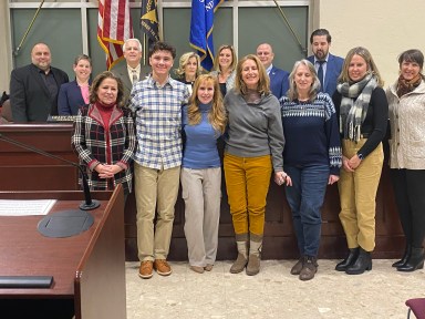 Newly appointed members of the Glen Cove Beautification Commission stand with city council members