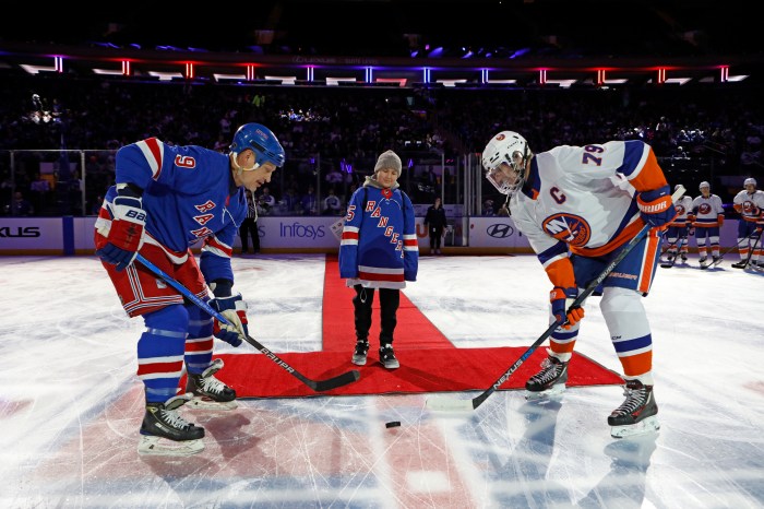 Ryan Scarry performing the ceremonial puck drop at the New York Rangers vs. New York Islanders Alumni Classic.