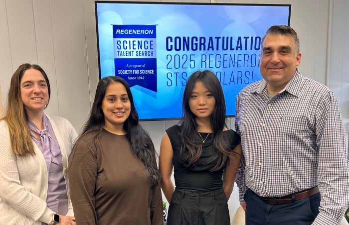 Principal Dr. Heather Dvorak, from left, Research Lab Facilitator Ms. Rohe Sheikh, Chloe Lee, and Lead Research Coordinator Raymond Tesar.