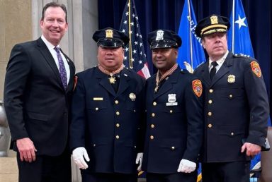 L.-R.: Robert Waring, Ed Hugh, Thomas Joy, and Gerard Hardy attend a ceremony where Hugh and Joy were honored for helping the Asian-American community. (SCPD)