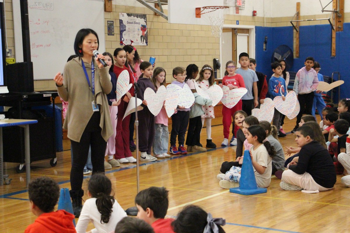 East Hills School principal Sherry Ma with students at closing Kindness Project ceremony.