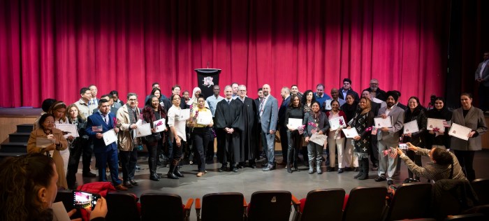 3 Naturalization Ceremony group photo at Mineola High School