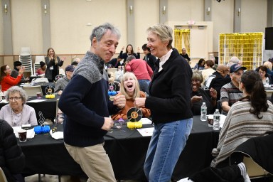 Attendees dance at Radio Bingo, a launch event for Family Care Connect, powered by National Mah Jongg League at Sid Jacobson JCC.