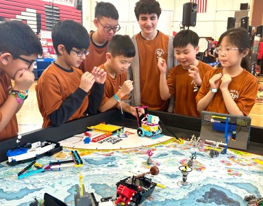 Great Neck students competing at the FIRST LEGO League Regional in Mineola