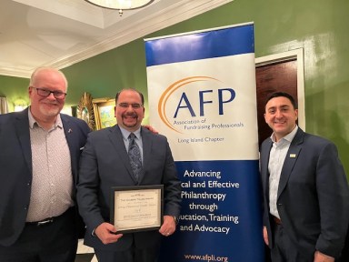 AVP of Business Banking Ray Schwetz, Senior Manager of Business Development Joseph Prinzo, and VP of Business Development Peter Purpura attended the award ceremony and accepted the plaque on behalf of Jovia.