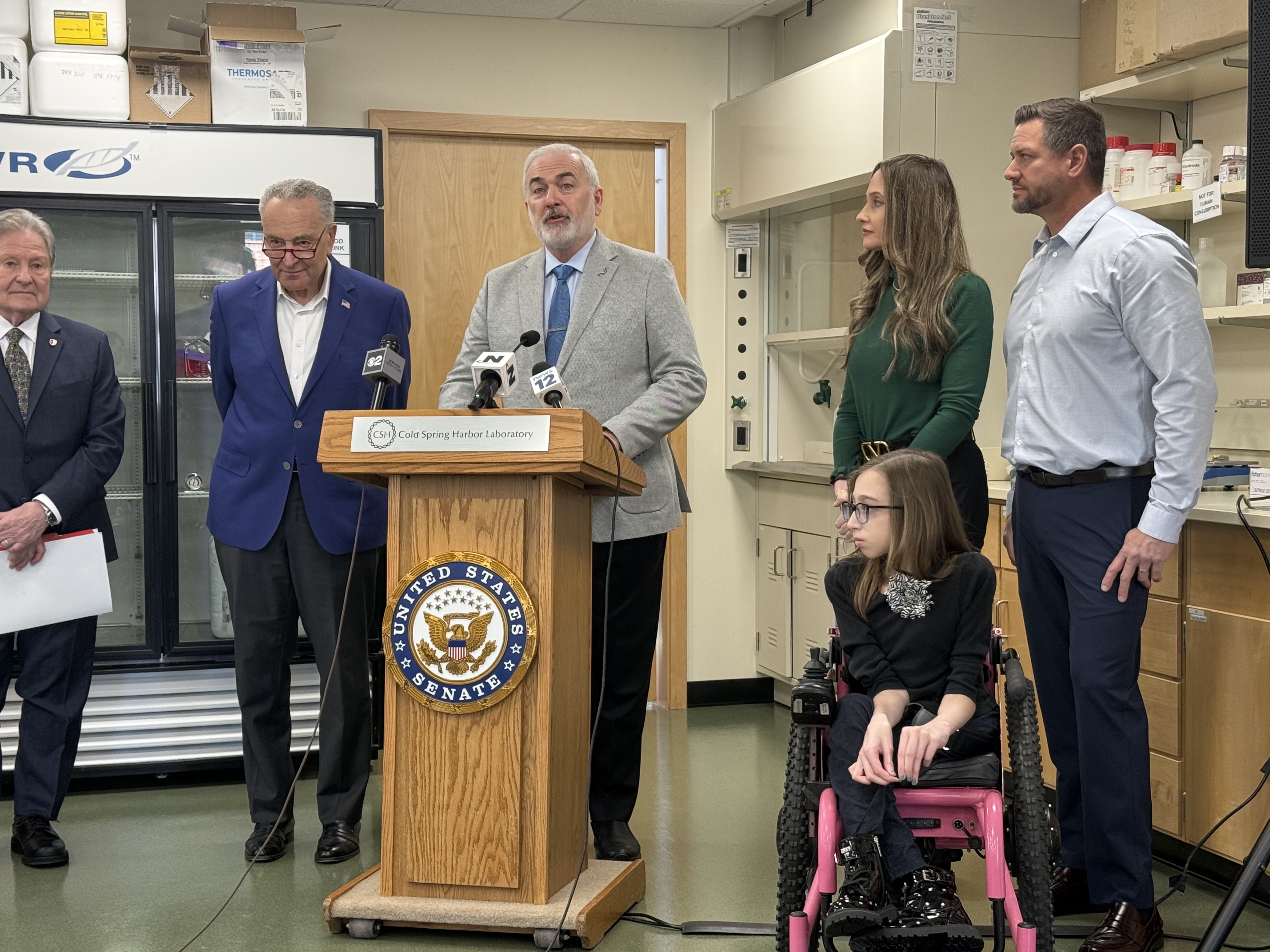 National Institutes of Health (NIH) cuts would slow or halt lifesaving medical research on Long Island, said Senator Chuck Schumer, left, and Dr. Adrian Kraimer of Cold Spring Harbor Labs.