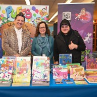 Local children's book author Joe Costa, Library Director of Middle Country Public Library Sophia Serlis-McPhillips and local children's book author and illustrator Jim Coccaro.