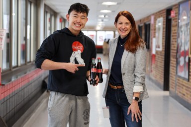 Derek Chen, left, and Carisa Steinberg, right. celebrate Derek’s receipt of the Coca-Cola Scholars Award