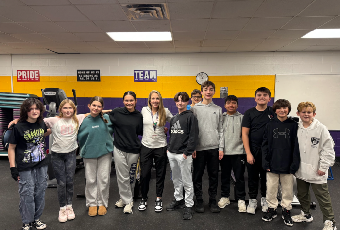 Victoria Wink, center, with her seventh and eighth-grade physical education classes