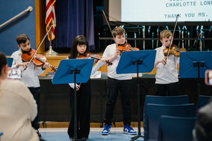 The string orchestra delivered two beautiful performances, featuring studentson violin, cello and bass.