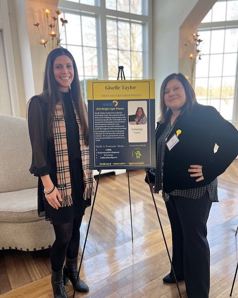 Giselle Taylor, right, earns Bright Light Award for her work in the Glen Cove City School District