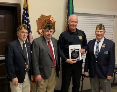 Michael Spae receives a Public Servant Award from the Syosset VFW